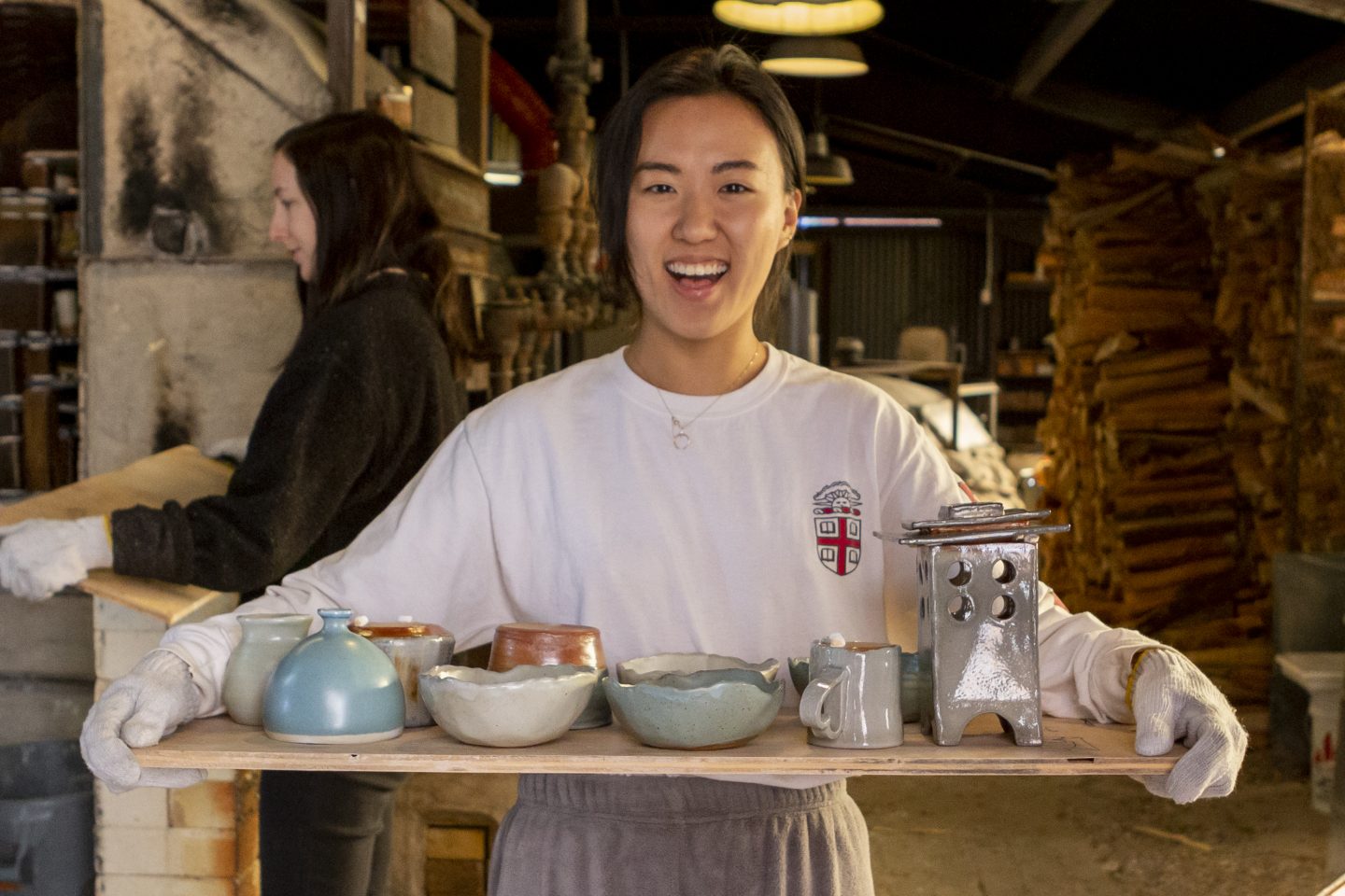 ceramic pots fresh out of the kiln happy