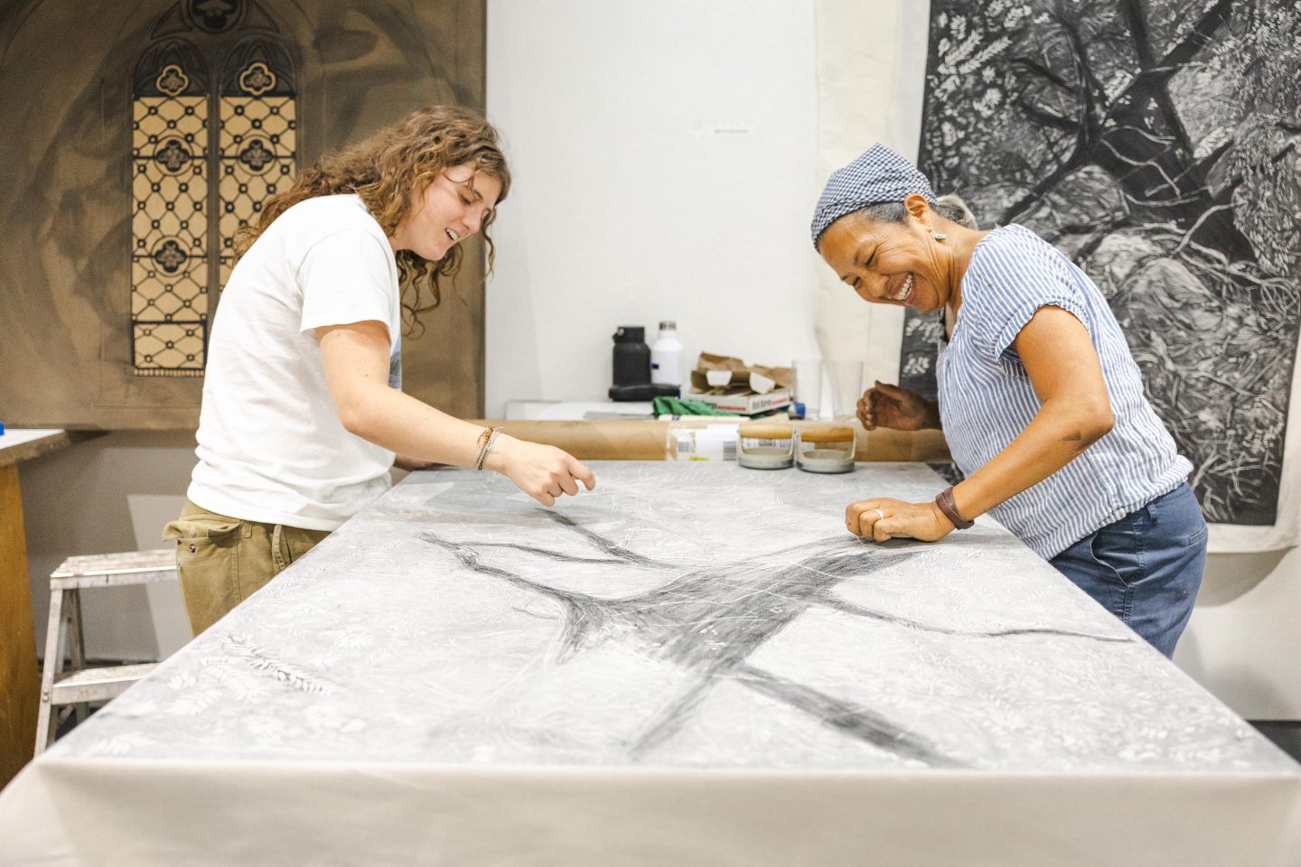 artist working on a printmaking piece in a studio at Anderson Ranch Arts Center