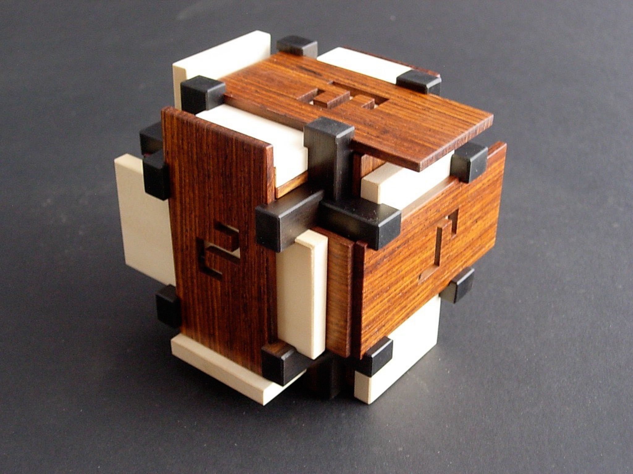 intricate wooden puzzle box components and mechanism details displayed in a woodworking studio at Anderson Ranch Arts Center