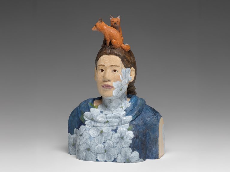 woodcarving tools and partially carved wooden animal figures displayed in a studio at Anderson Ranch Arts Center