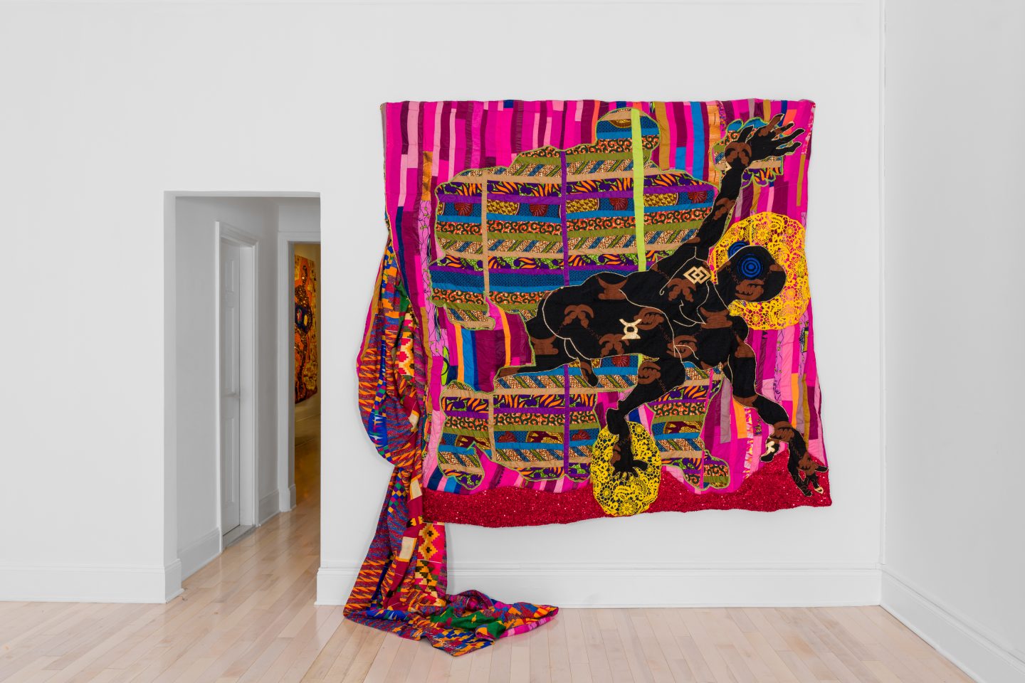 Pink wall quilt by Basil Kincaid