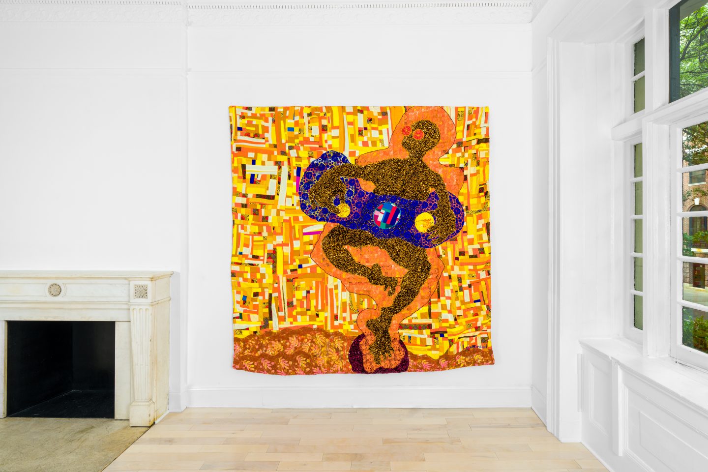 Orange quilt wall piece