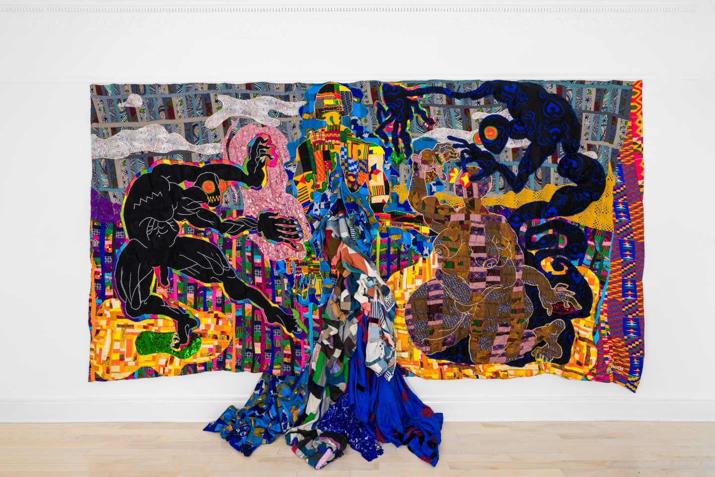 Quilt by Basil Kincaid, bright colorful wall piece.